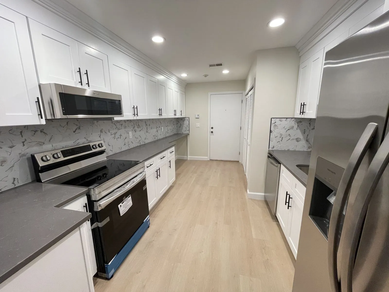 White shaker galley kitchen